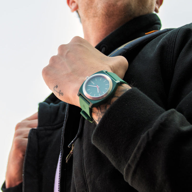 Man wearing the Nixon Time Teller OPP